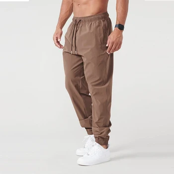 Новата Пролетно-есенни мъжки спортни панталони, панталони за джогинг, бързо съхнещи Всекидневни спортни панталони, разтеглив, свободни панталони, мъжки панталони с завязками на краката